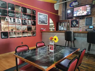 a dining room with a table and chairs at The True The Archive Lofts in Marion