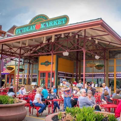 a group of people sitting outside of a restaurant at Relaxing home near Interstate in Monroe