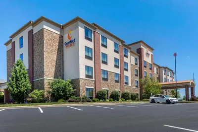 a hotel with a car parked in front of it at Comfort Suites Bridgeport - Clarksburg in Bridgeport