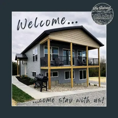 a welcome sign for a home she with us at 100 Acre Relaxing Retreat Near ARK- The Woodlands in Williamstown