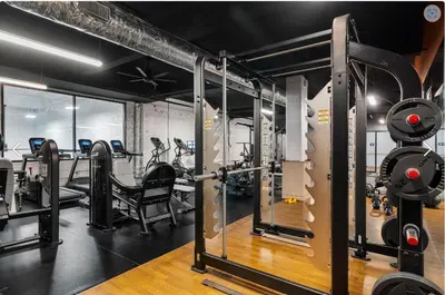 a gym with several treadmills and machines at Downtown/Bengals/Reds/TQL/OTR in Cincinnati