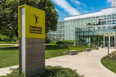 a yellow sign in front of a building at Modern Apartment with Pool Table! Pet-friendly! in Columbus