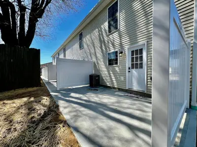 a house with a white door and a fence at Brand new, hidden Pearl of a home Batesville, IN in Batesville