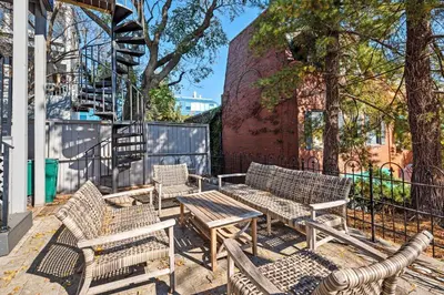 a group of benches and tables on a sidewalk at Clawfoot Tub, Next to Monastery Wedding Venue, 3BR in Cincinnati