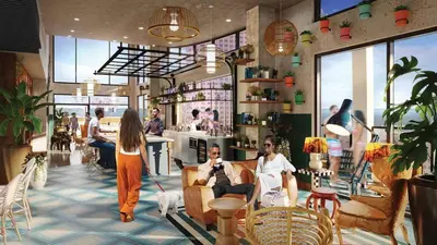 a rendering of a restaurant with people sitting in chairs at Sleek downtown Cleveland apartment in Cleveland