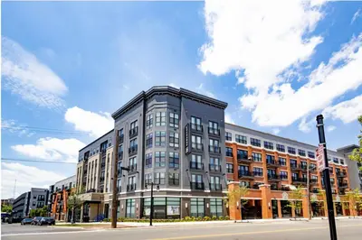 a large building on the corner of a street at 2 Stylish apartments near shops and entertainment in Cincinnati