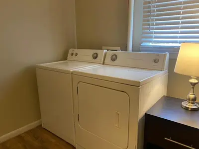 a white washer and dryer in a room at Dayton with 6 Beds Sleeps 8 4 Bedrooms plus WIFI in Dayton
