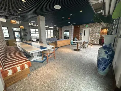 a room with a ping pong table and a vase at Brand new 2BR 3BA combined apartments with city views in Cleveland