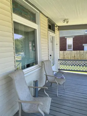 two chairs on the porch of a house at Cozy Studio Private room in Cincinnati