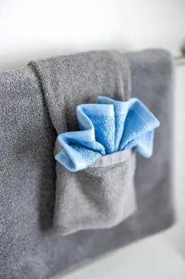 a blue bow tie on a gray shirt at Luxury Downtown Townhome Private Garage Unit 3 in Cleveland