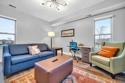 a living room with a couch and two chairs at Cle Suites 1BR 1BA 5 min Walk to Cle Clinic #10 in Cleveland