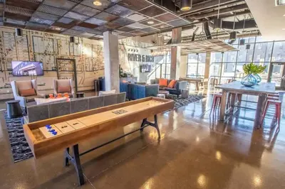 a room with a pool table in the middle of it at Near Osu Riverside No Steps Garage Parking! in Columbus