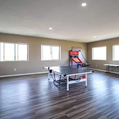 an empty room with a ping pong table in it at Breathtaking Family Friendly Tented Cabin in Logan, Ohio in Logan