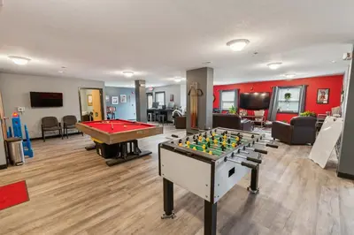a living room with a pool table and a billiard at Spacious and Modern Stay to Relax & Recharge in Mansfield
