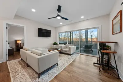 a living room with white furniture and a large window at Adamina Canyon Luxurious, Canyon View 5BR, 3BTH 1 in Rockbridge