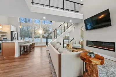 a large living room with a couch and a table at Adamina Canyon Luxurious, Canyon View 5BR 3BTH- 6 in Rockbridge