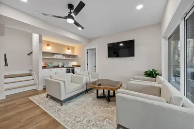 a living room with white furniture and a tv at Adamina Canyon Luxurious, Brand New 5BR 3BTH 7 in Rockbridge
