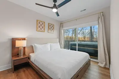 a bedroom with a bed and a large window at Adamina Canyon Luxurious, Canyon View 5BR 3BTH 8 in Rockbridge