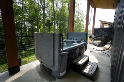a large grill on a screened in porch at Legends Lane A - by The Chalets in Logan