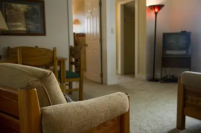 a living room with a couch and a television at Tranquil Weekend Getaway for a Large Group near the Cuyahoga Valley National Park, Ohio in Sandusky