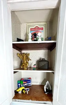 a shelf in a room with toys on it at Sleep with a LION! 3 bedroom, near Downtown, Tremont, Ohio city!! in Cleveland