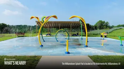 a splash park with a playground with a water slide at The Lodges at Eden Reserve - Cabin Loop - Near Ark in Williamstown