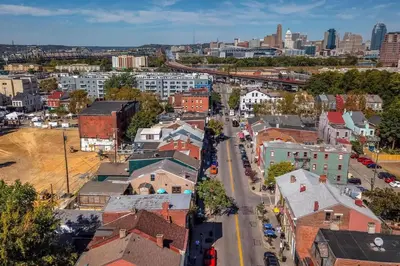 an aerial view of a city with a street at Heart of Mainstrasse Suites in Covington