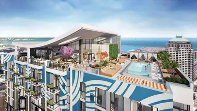 an aerial view of a building with a swimming pool at 10 Brand new combined apartments with city views in Cleveland