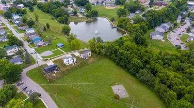 an aerial view of a park with a lake and houses at 4BR, 2 & half Bath, Hot Tub, Private Parking, Near Ark in Dry Ridge