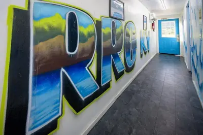 a hallway with graffiti on the wall at Furnished Glamping Tent/River Access/2 Queen Beds in Stanton