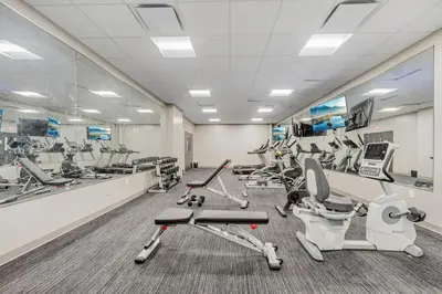 a gym with treadmills and elliptical machines at DT Fast Wifi Pet Friendly Bidet Sprayer in Cleveland