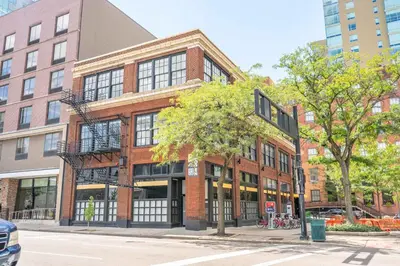 a red brick building on a city street at The 333 Suites 203 - Stay for 6 in Cincinnati