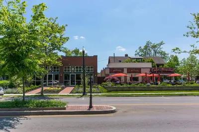 an empty street in front of a building with a restaurant at Bexley Family Friendly ★ King Bed ★ Staycation in Columbus