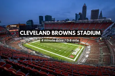 a view of a football stadium with red seats at LAKE VIEWS! 15th Floor Downtown High-Rise | Gym in Cleveland