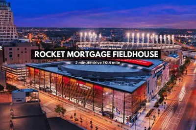 a night view of a rockett mortgage healthcare building at 13th Floor SkyTower: Paid Parking | Downtown | Gym in Cleveland