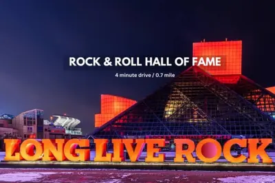 a sign that says long live rock in front of a building at The Playhouse Suites 1BD | Parking | Downtown in Cleveland