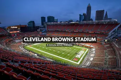 a view of a football stadium with red seats at LUXE Condo Downtown | Security•Gym•Parking in Cleveland