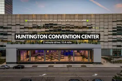 a building with a sign that reads humiliation convention center at Elegant Downtown Condo • Fitness Gym Included in Cleveland