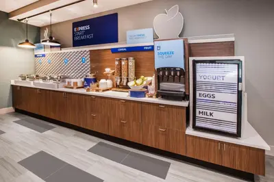 an apple store with a counter with an appleasteryasteryasteryasteryasteryasteryastery at Holiday Inn Express Hotel & Suites Cleveland-Richfield by IHG in Brecksville