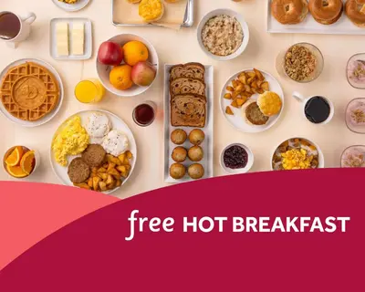 a table filled with different types of breakfast foods at Drury Inn & Suites Middletown Franklin in Middletown