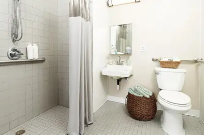 a bathroom with a toilet and a sink at InTown Suites Extended Stay Columbus OH - North in Columbus