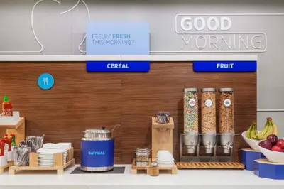 a grocery store with food items on a counter at Holiday Inn Express - Columbus Downtown by IHG in Columbus