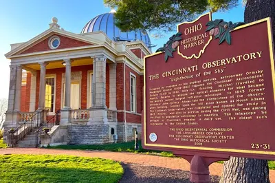 a building with a sign in front of it at Oakley Square 3BR Charmer - Total Walkability home in Cincinnati