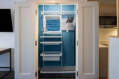 a room with a staircase in a kitchen with a window at TownePlace Suites by Marriott Georgetown in Georgetown